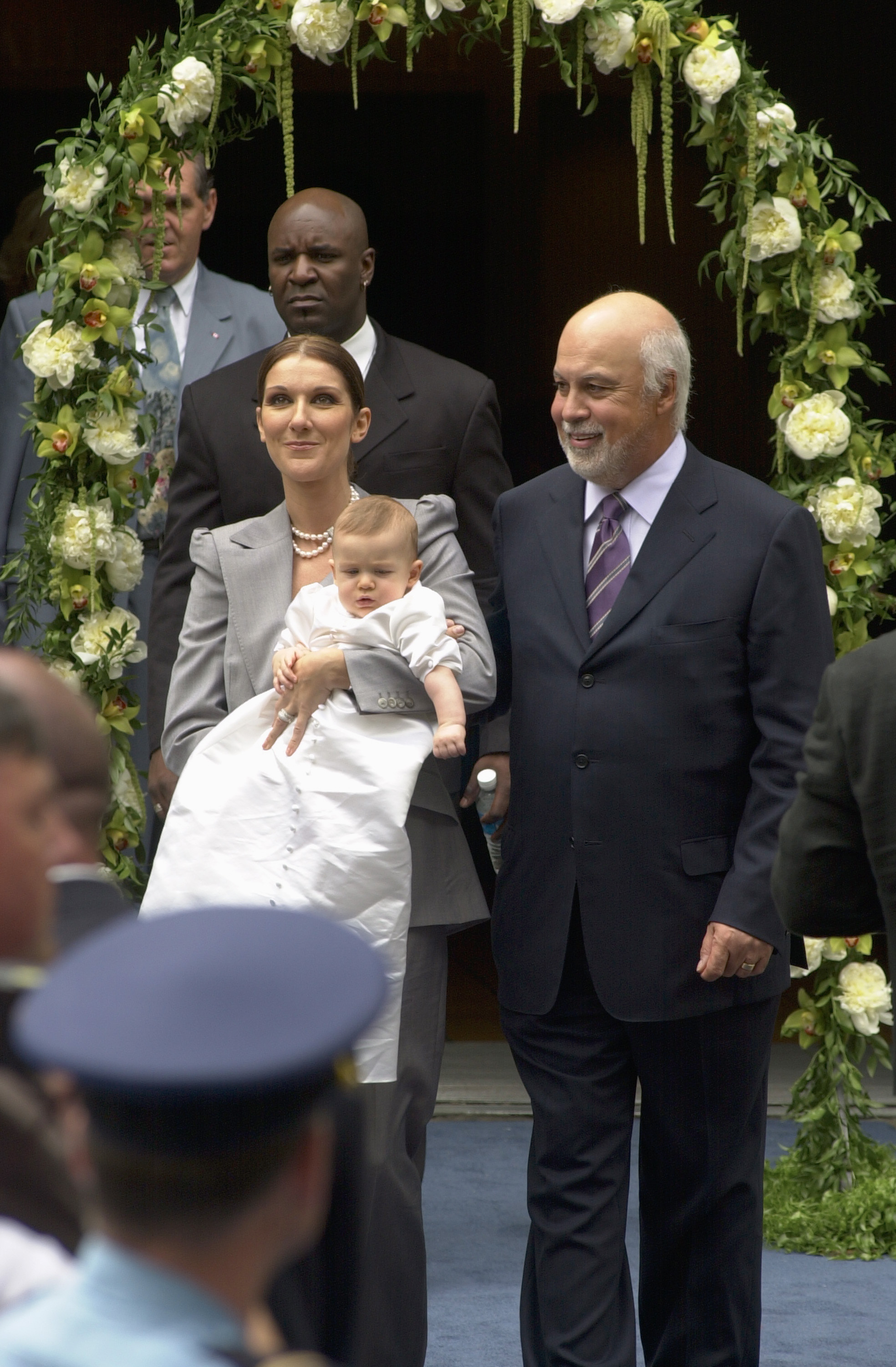 Celine Dion, Rene-Charles and Rene Angelil pictured leaving the chapel of the Notre-Dame Basilica on July 25, 200 in Montreal, Canada. | Source: Getty Images